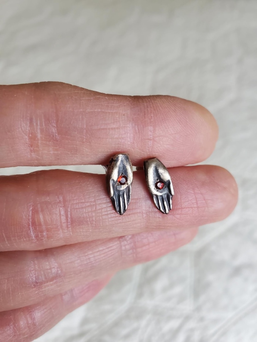 silver stud earrings little hands with red little stones